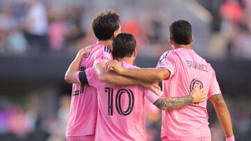 May 31, 2025; Fort Lauderdale, Florida, USA; Inter Miami CF forward Lionel Messi (10) celebrates after scoring with forward Tadeo Allende (21) and forward Luis Suarez (9) against the Columbus Crew during the first half at Chase Stadium. Mandatory Credit: Sam Navarro-Imagn Images