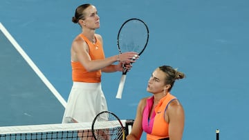 Belarus' Aryna Sabalenka (R) walks away after shaking hands with the umpire following her victory over Ukraine's Elina Svitolina in their women's singles semi-final match on day twelve of the Australian Open tennis tournament in Melbourne on January 29, 2026. (Photo by DAVID GRAY / AFP) / -- IMAGE RESTRICTED TO EDITORIAL USE - STRICTLY NO COMMERCIAL USE --