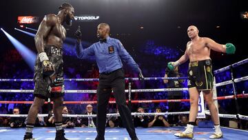 Deontay Wilder y Tyson Fury durante su segundo combate.