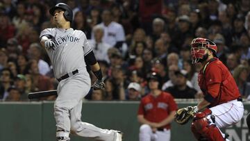 Sep 16, 2016; Boston, MA, USA; New York Yankees catcher Gary Sanchez (24) hits an RBI double during the fifth inning against the Boston Red Sox at Fenway Park. Mandatory Credit: Bob DeChiara-USA TODAY Sports