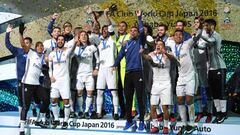 YOKOHAMA, JAPAN - DECEMBER 18:  Sergio Ramos of Real Madrid lifts the trophy as him and his team mates celebrate victory following the FIFA Club World Cup Final match between Real Madrid and Kashima Antlers at International Stadium Yokohama on December 18, 2016 in Yokohama, Japan.  (Photo by Mike Hewitt - FIFA/FIFA via Getty Images)