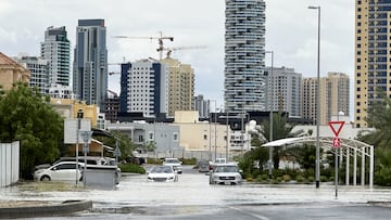 Cars drive through a flooded street during a rain storm in Dubai, United Arab Emirates, April 16, 2024. REUTERS/Abdel Hadi Ramahi