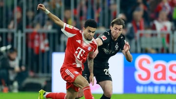 Soccer Football - Bundesliga - Bayern Munich v Borussia Moenchengladbach - Allianz Arena, Munich, Germany - March 6, 2026 Bayern Munich's Luis Diaz in action with Borussia Moenchengladbach's Joe Scally REUTERS/Heiko Becker DFL REGULATIONS PROHIBIT ANY USE OF PHOTOGRAPHS AS IMAGE SEQUENCES AND/OR QUASI-VIDEO.