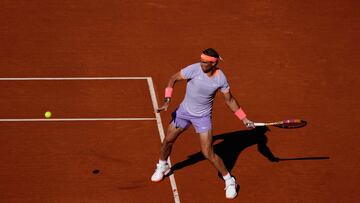 Spain's Rafael Nadal returns the ball to Italy's Flavio Cobolli during the ATP Barcelona Open "Conde de Godo" tennis tournament singles match at the Real Club de Tenis in Barcelona, on April 16, 2024. (Photo by PAU BARRENA / AFP)