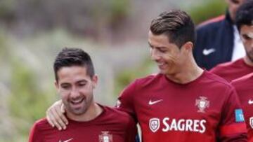 Joao Moutinho, con Cristiano Ronaldo.