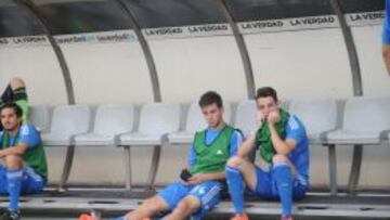 Los jugadores del Castilla, hundidos.