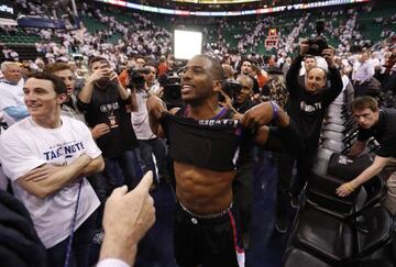 LA Clippers guard Chris Paul gives his jersey to a fan after beating the Utah Jazz 111-106 in game three of the first round of the 2017 NBA Playoffs