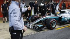 Mercedes driver Lewis Hamilton of Britain gets a thumbs up to leave the pit lane during a Formula One pre-season testing session at the Catalunya racetrack in Montmelo, outside Barcelona, Spain, Thursday, March 9, 2017. (AP Photo/Francisco Seco)