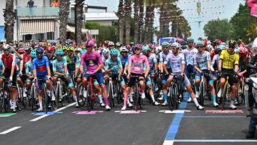 Martinsicuro (Italy), 16/05/2024.- (front L-R) German rider Simon Geschke of Cofidis team wearing the best climber's blue jersey, Italian rider Jonathan Milan of Lidl-Trek team wearing the points classification leader's cyclamen jersey, Slovenian rider Tadej Pogacar of Uae Team Emirates wearing the overall leader's pink jersey, Italian rider Antonio Tiberi of Bahrain Victorius wearing the best young rider's white jersey, line up for the start of the 12th stage of the 2024 Giro d'Italia, a 193 km cycling race from Martinsicuro to Fano, Italy, 16 May 2024. (Ciclismo, Bahrein, Italia, Eslovenia) EFE/EPA/LUCA ZENNARO