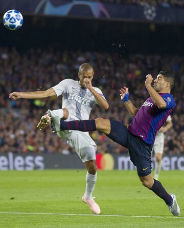 Luis Suárez y Joao Miranda.