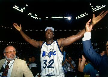 <b>- Años en la NBA:</b> 1992-2011 <br> <b>- Equipos:</b> Orlando Magic, Los Angeles Lakers, Miami Heat, Phoenix Suns, Cleveland Cavaliers y Boston Celtics. <b>- Medias de su carrera:</b> 23,7 puntos, 10,9 rebotes, 2,3 tapones. <br> <b>- Mejor temporada:</b> (1999-2000) 29,7 puntos, 13,6 rebotes, 3 tapones. <br> <b>- Méritos:</b> Cuatro veces campeón, una vez MVP, tres veces MVP de las Finales, 15 veces all star, ocho en el Mejor Quinteto. <br> <br> Uno de los jugadores más dominantes de la historia, no alargó su pico de rendimiento pero pocos han sido tan demoledores como él durante esos años de esplendor. Enorme, poderoso y muy rápido de pies para su volumen, no había forma de detenerlo durante sus mejores años en los Lakers. Después fue campeón en Miami Heat, ya subordinado a Dwyane Wade.