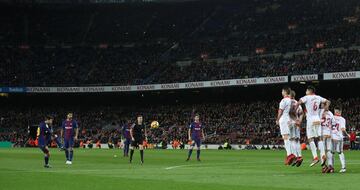 Lionel Messi scores his side's second goal from a free kick.