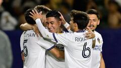 May 10, 2023; Carson, CA, USA; Los Angeles Galaxy midfielder Memo Rodriguez (20), center, is congratulated after scoring a goal in the second half against the Seattle Sounders at Dignity Health Sports Park. Mandatory Credit: Jayne Kamin-Oncea-USA TODAY Sports