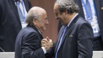 Platini, con Blatter.