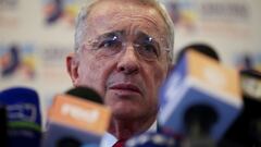 FILE PHOTO: Colombia's former president Alvaro Uribe reacts to the media after his meeting with President-elect Gustavo Petro in Bogota, Colombia June 29, 2022. REUTERS/Luisa Gonzalez/File Photo