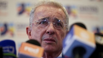 FILE PHOTO: Colombia's former president Alvaro Uribe reacts to the media after his meeting with President-elect Gustavo Petro in Bogota, Colombia June 29, 2022. REUTERS/Luisa Gonzalez/File Photo