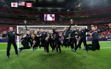 The United States women's soccer team celebrates with the the gold medal after defeating Japan by a score of 2-1 to win the Women's Football gold medal match on Day 13 of the London 2012 Olympic Games at Wembley Stadium on August 9, 2012 in London, Englan