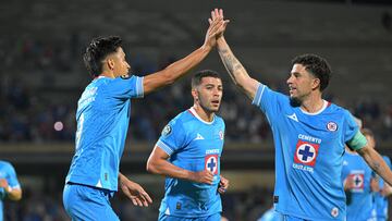 Angel Sepulveda celebrates his goal 2-0 with Jose Rivero of Cruz Azul during the round of 16 second leg match between Cruz Azul and Seattle Sounders as part of the CONCACAF Champions Cup 2025, at Olimpico Universitario Stadium on March 11, 2025 in Mexico City, Mexico.