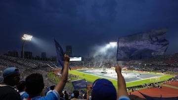 Jun 1, 2025; Mexico City, MEX; Fans wave flags during the opening ceremony prior to the match between Cruz Azul and Vancouver Whitecaps FC during the final of the Concacaf Champions Cup at Estadio Olímpico Universitario. Mandatory Credit: Kirby Lee-Imagn Images