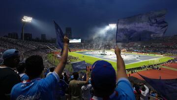 Jun 1, 2025; Mexico City, MEX; Fans wave flags during the opening ceremony prior to the match between Cruz Azul and Vancouver Whitecaps FC during the final of the Concacaf Champions Cup at Estadio Olímpico Universitario. Mandatory Credit: Kirby Lee-Imagn Images