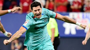 Barcelona's Polish forward #09 Robert Lewandowski celebrates scoring his team's second goal scored from the penalty spot during the Spanish Liga football match between CA Osasuna and FC Barcelona at El Sadar stadium in Pamplona on September 3, 2023. (Photo by ANDER GILLENEA / AFP)