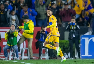 Tigres' Ozziel Herrera celebrates after scoring against America during their Mexican Apertura 2023 football tournament match at the Universitario stadium in Monterrey, Mexico, on December 14, 2023. (Photo by Julio Cesar AGUILAR / AFP)