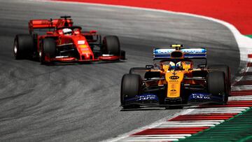 SPIELBERG, AUSTRIA - JUNE 30: Lando Norris of Great Britain driving the (4) McLaren F1 Team MCL34 Renault leads Sebastian Vettel of Germany driving the (5) Scuderia Ferrari SF90 on track during the F1 Grand Prix of Austria at Red Bull Ring on June 30, 2019 in Spielberg, Austria. (Photo by Bryn Lennon/Getty Images)