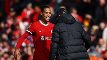 Soccer Football - Premier League - Liverpool v Brighton & Hove Albion - Anfield, Liverpool, Britain - March 31, 2024 Liverpool's Virgil van Dijk and manager Juergen Klopp celebrate after the match REUTERS/Molly Darlington NO USE WITH UNAUTHORIZED AUDIO, VIDEO, DATA, FIXTURE LISTS, CLUB/LEAGUE LOGOS OR 'LIVE' SERVICES. ONLINE IN-MATCH USE LIMITED TO 45 IMAGES, NO VIDEO EMULATION. NO USE IN BETTING, GAMES OR SINGLE CLUB/LEAGUE/PLAYER PUBLICATIONS.