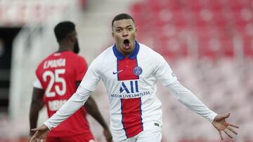 Soccer Football - Ligue 1 - Dijon v Paris St Germain - Stade Gaston Gerard, Dijon, - February 27, 2021 Paris St Germain's Kylian Mbappe celebrates scoring their third goal REUTERS/Benoit Tessier