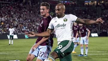 Portland Timbers forward Samuel Armenteros (99) controls the ball against Colorado Rapids defender Deklan Wynne during the second half of an MLS soccer match Saturday, May 26, 2018, in Commerce City, Colo. Portland won 3-2. (AP Photo/Jack Dempsey)