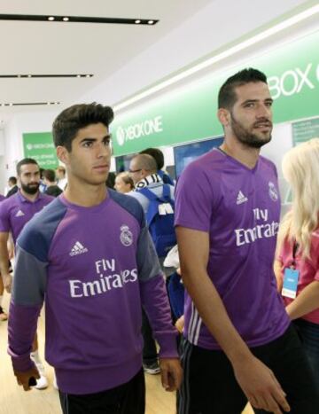 Marco Asensio y Kiko Caasilla.