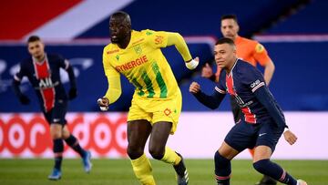 14 March 2021, France, Paris: Nantes' Abdoulaye Toure (L) in action against PSG's Kylian Mbappe during the French Ligue 1 soccer match between Paris Saint-Germain and FC Nantes at Le Parc des Princes stadium. Photo: Franck Fife/AFP/dpa
14/03/20
