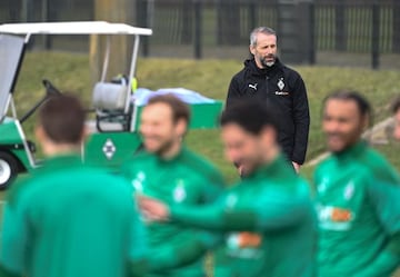 Borussia Mönchengladbach head coach Marco Rose watches his players during a training session on the eve of their Champions League, last-16 first leg against Manchester City.