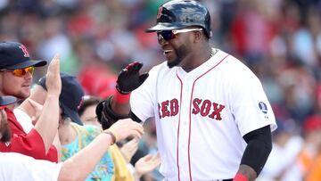 FILE PHOTO: Boston Red Sox designated hitter David Ortiz celebrates his solo home in the sixth inning against the Toronto Blue Jays during their MLB American League East baseball game in Boston, Massachusetts, September 22, 2013.  REUTERS/Dominick Reuter/File Photo