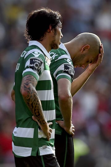 Sporting's Islam Slimani (R) and Bryan Ruiz.