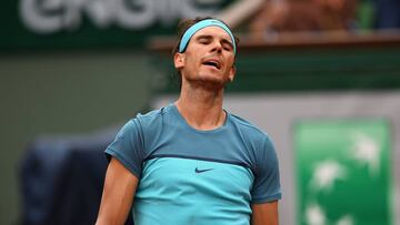 Rafa Nadal is forced to retire from the French Open with a wrist strain.