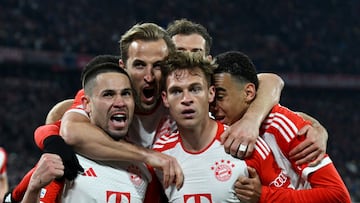 Soccer Football - Champions League - Quarter Final - Second Leg - Bayern Munich v Arsenal - Allianz Arena, Munich, Germany - April 17, 2024 Bayern Munich's Joshua Kimmich celebrates scoring their first goal with Raphael Guerreiro, Harry Kane and Jamal Musiala REUTERS/Angelika Warmuth     TPX IMAGES OF THE DAY