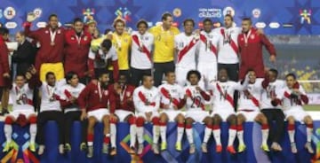 Peru players pose with their medals after defeating Paraguay in their Copa America 2015 third-place soccer match at Estadio Municipal Alcaldesa Ester Roa Rebolledo in Concepcion, Chile, July 3, 2015.  REUTERS/Andres Stapff