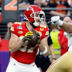 Why do NFL players wear a towel when they play?