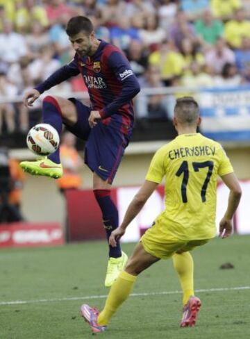 Gerard Piqué y Denis Cheryshev.