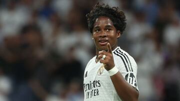 Real Madrid's Brazilian forward #16 Endrick celebrates after scoring his team's third goal during the UEFA Champions League 1st round day 1 football match between Real Madrid CF and Stuttgart VFB at the Santiago Bernabeu stadium in Madrid on September 17, 2024. (Photo by Pierre-Philippe MARCOU / AFP)