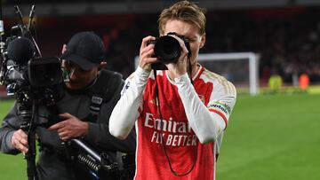 LONDON, ENGLAND - FEBRUARY 04: Arsenal captain Martin Odegaard takes pictures after the Premier League match between Arsenal FC and Liverpool FC at Emirates Stadium on February 04, 2024 in London, England. (Photo by Stuart MacFarlane/Arsenal FC via Getty Images)