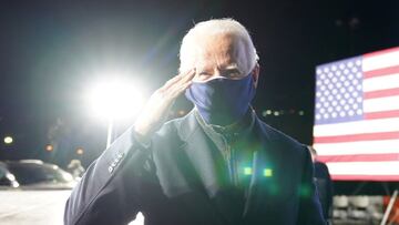 Joe Biden, then Democratic U.S. presidential nominee, salutes at a drive-in campaign rally at Lexington Technology Park in Pittsburgh, Pennsylvania, U.S., November 2, 2020. REUTERS/Kevin Lamarque