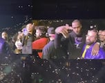 LeBron and Bronny James accompany Drake on stage