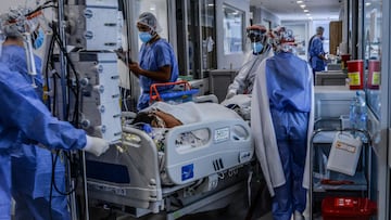 In this photo taken on May 22, 2021 health workers care for a Covid-19 patient in the intensive care unit (ICU) in Bogota. - The new coronavirus variant detected for the first time in Colombia and called &quot;mu&quot; caused the deadliest wave of the pan