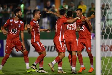 Walter Bou (2nd R) of Chile's Union La Calera, celebrates his goal with teammates scored against of Brazil\x92s Chapecoense, during their 2019 Copa Sudamericana football match held at Arena Conda stadium, in Chapeco, Brazil on February 19, 2019. (Photo by NELSON ALMEIDA / AFP)