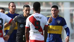 Boca Juniors' defender Marcos Rojo (R) argues with River Plate's Colombian forward Miguel Borja during the Argentine Professional Football League Cup quarter-final match between River Plate and Boca Juniors at the Mario Alberto Kempes Stadium in Cordoba, Argentina, on April 21, 2024. (Photo by ALEJANDRO PAGNI / AFP)
