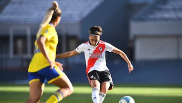 BUENOS AIRES, ARGENTINA - MARCH 27: Martina Del Trecco of River Plate shoots on target and scores the equalizer of her team during a match between River Plate and Boca Juniors as part of the Women's First Division League at Estadio Monumental Antonio Vespucio Liberti on March 27, 2022 in Buenos Aires, Argentina. (Photo by Rodrigo Valle/Getty Images)