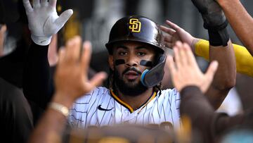 SAN DIEGO, CALIFORNIA - AUGUST 16: Fernando Tatis Jr. #23 of the San Diego Padres is congratulated in the dugout after scoring a run against the Baltimore Orioles during the third inning at PETCO Park on August 16, 2023 in San Diego, California. Orlando Ramirez/Getty Images/AFP (Photo by Orlando Ramirez / GETTY IMAGES NORTH AMERICA / Getty Images via AFP)