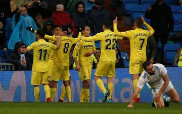 Villarreal's Pablo Fornals celebrates scoring their first goal with teammates.